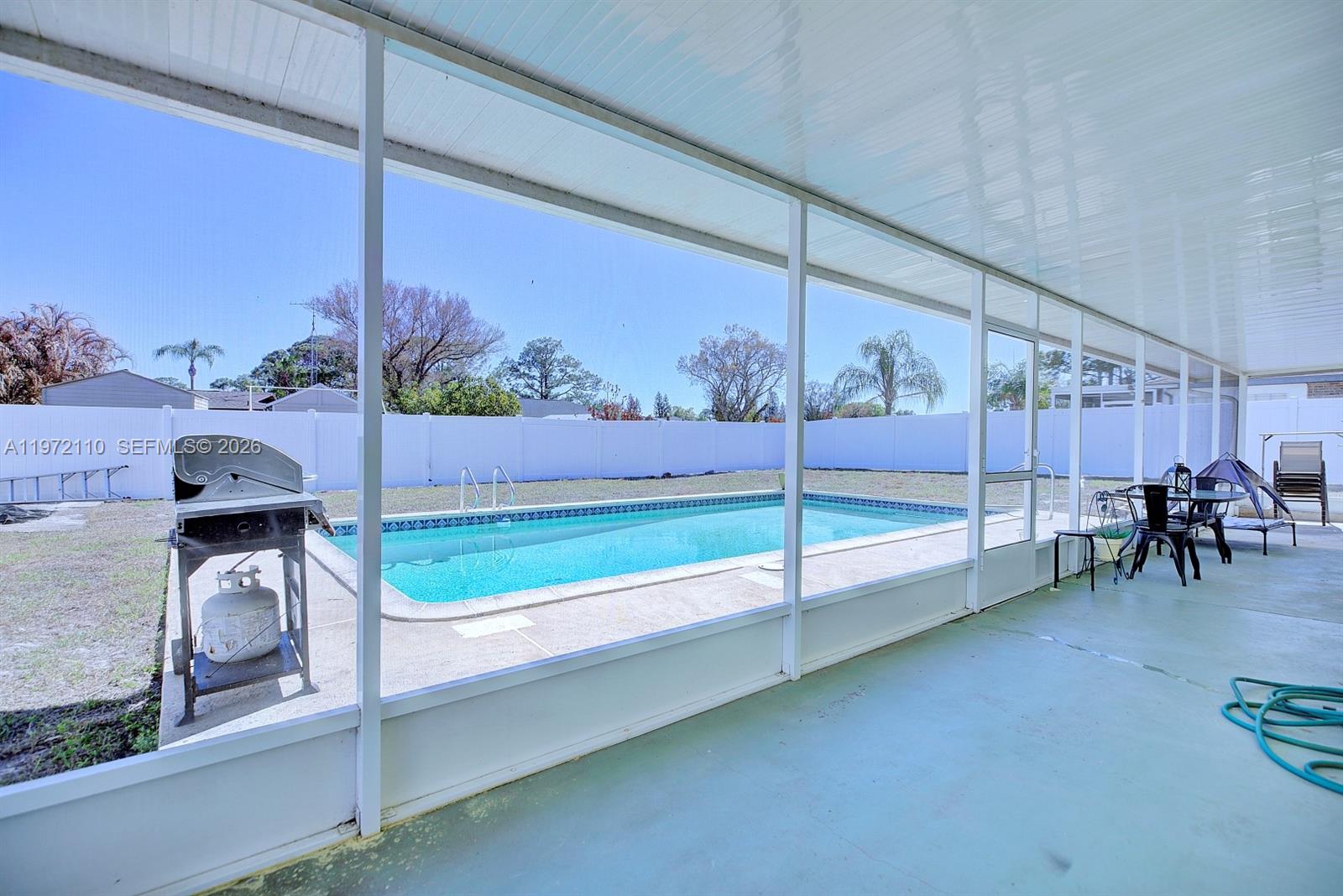 4131 Bianca Street Sebring, FL 33872 - Photo 26 of 30 a view of a room with gym equipment