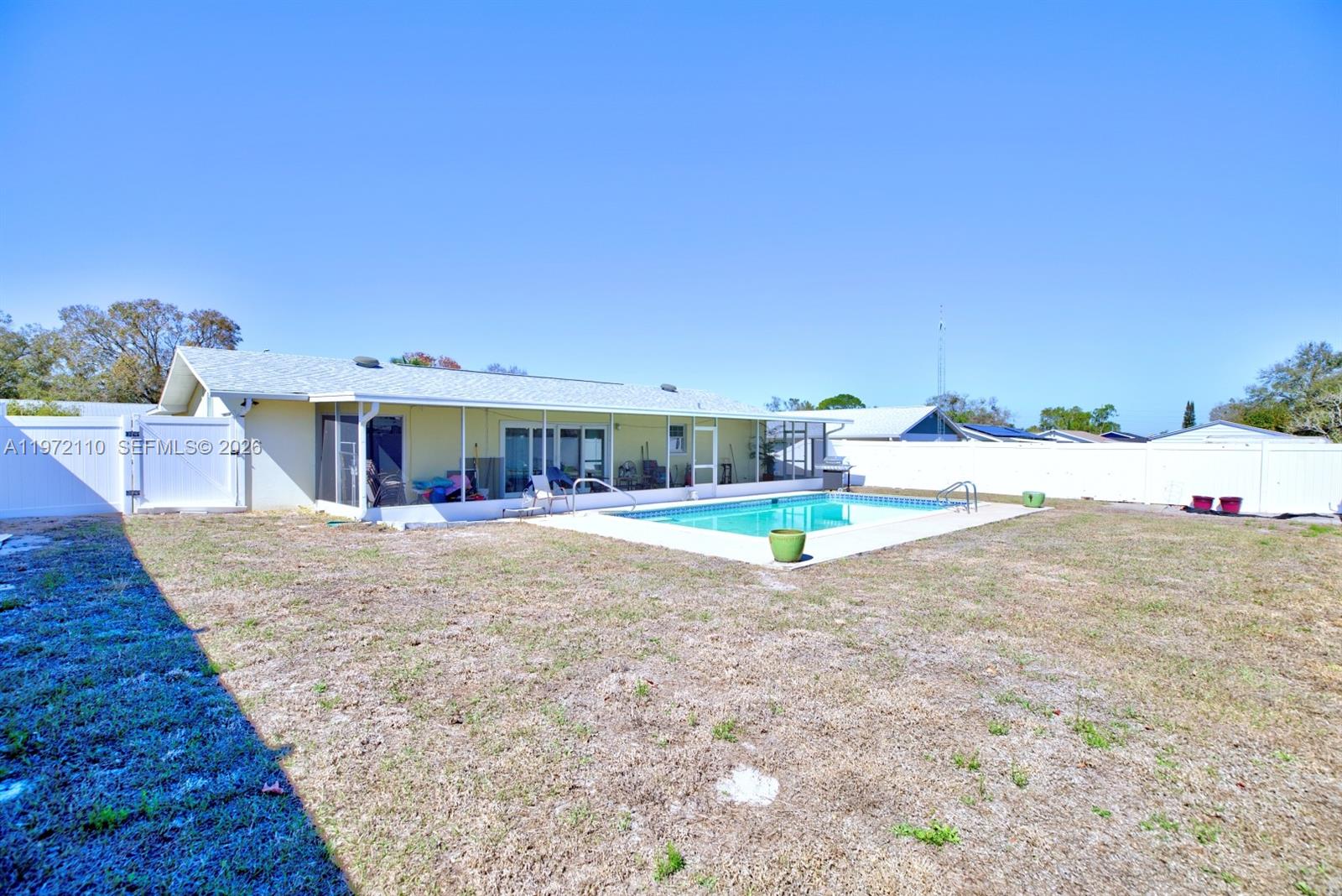 4131 Bianca Street Sebring, FL 33872 - Photo 29 of 30 swimming pool view with a outdoor space