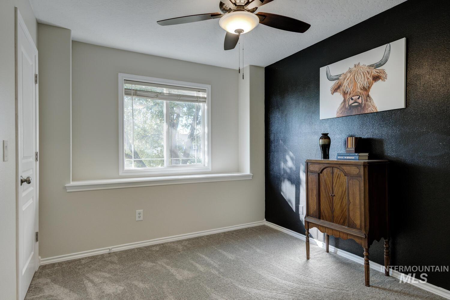 4428 West Campfire Street Meridian, ID 83646 - Photo 33 of 46 Office area with carpet floors and a ceiling fan