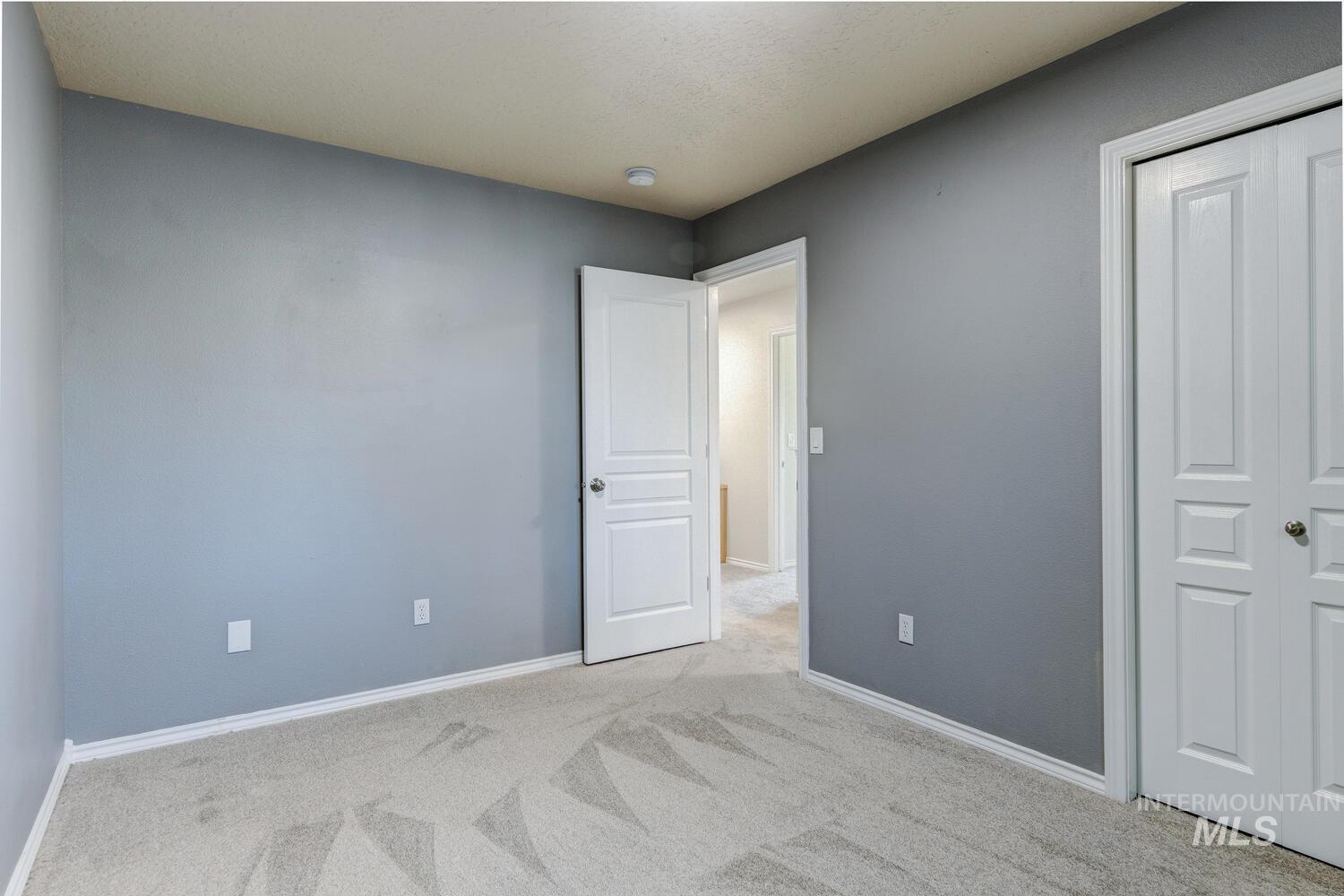 4428 West Campfire Street Meridian, ID 83646 - Photo 37 of 46 Unfurnished bedroom featuring carpet flooring and a closet