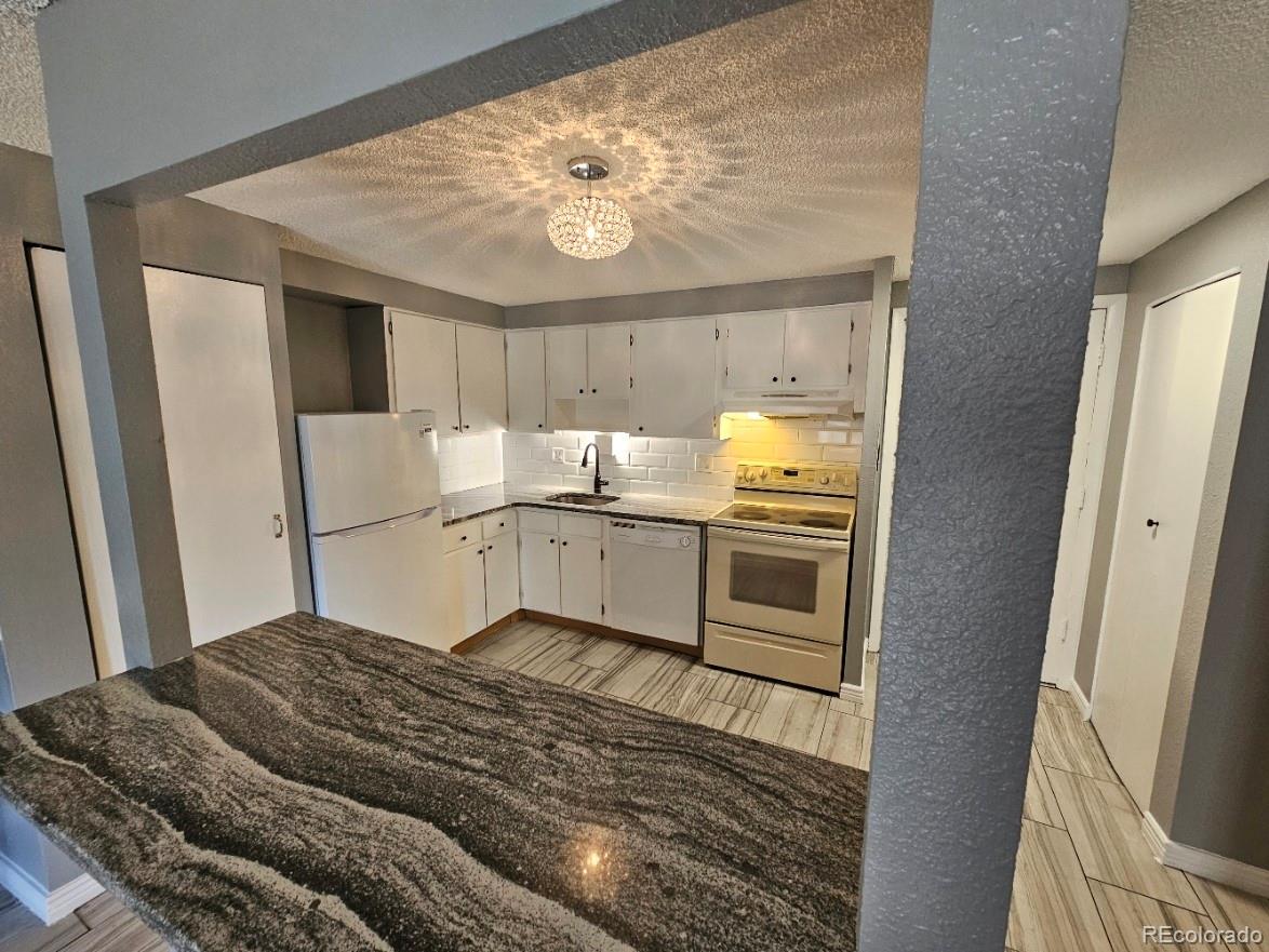 1302 South Parker Road, Unit 128 Denver, CO 80231 - Photo 1 of 12