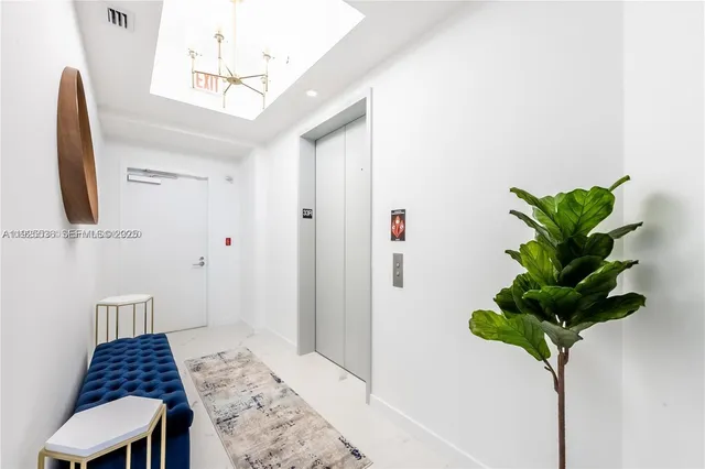 a vase of flowers sitting on a table