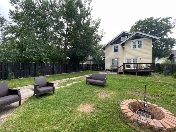 a garden view with a seating space