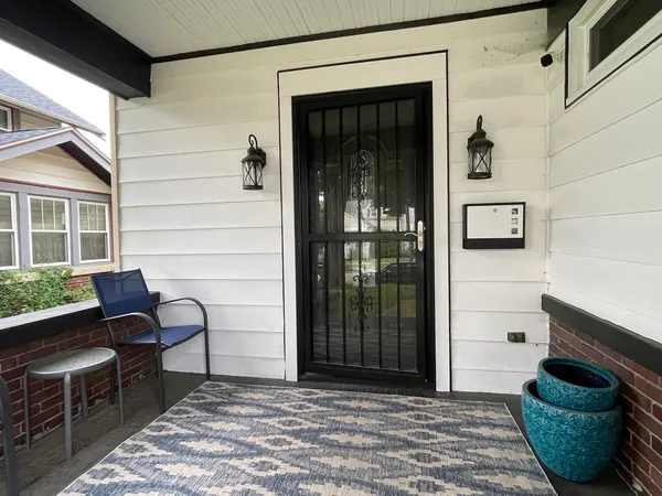 a view of a entryway door front of house