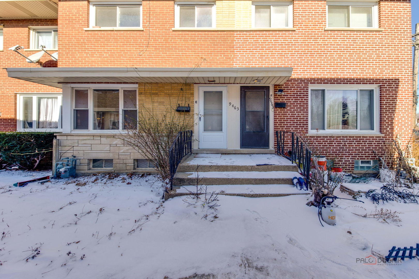 9463 Niles Center Road, Unit E Skokie, IL 60076 - Photo 1 of 30 a front view of a house with outdoor seating