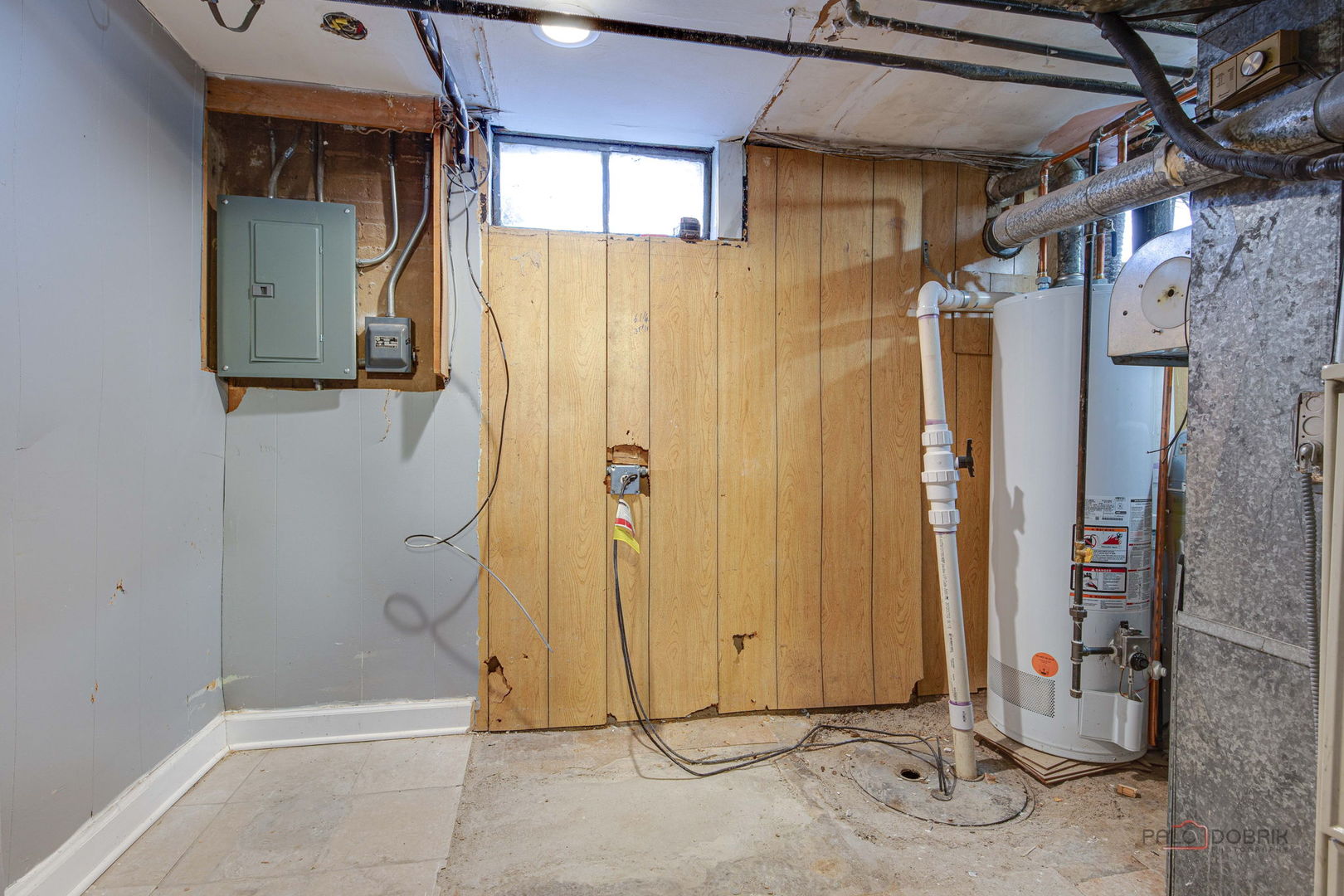 9463 Niles Center Road, Unit E Skokie, IL 60076 - Photo 26 of 30 a view of a bathroom with a shower and a sink