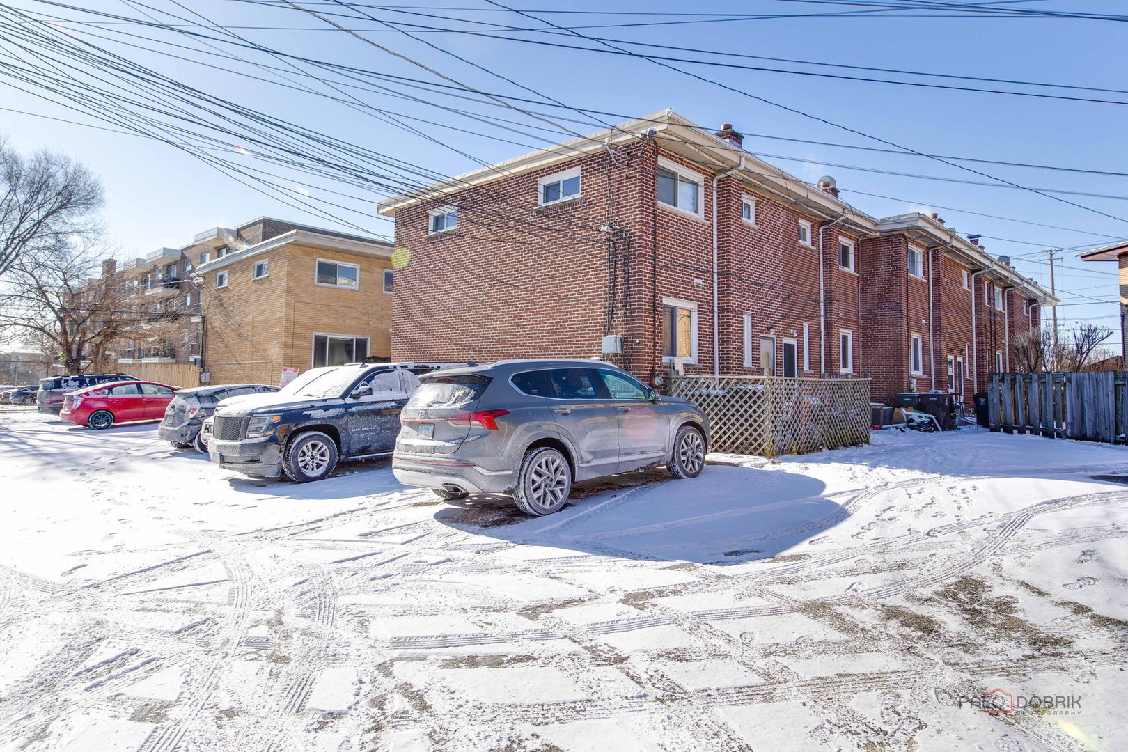9463 Niles Center Road, Unit E Skokie, IL 60076 - Photo 30 of 30 a car parked in front of a house