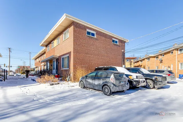 a car parked in front of a house