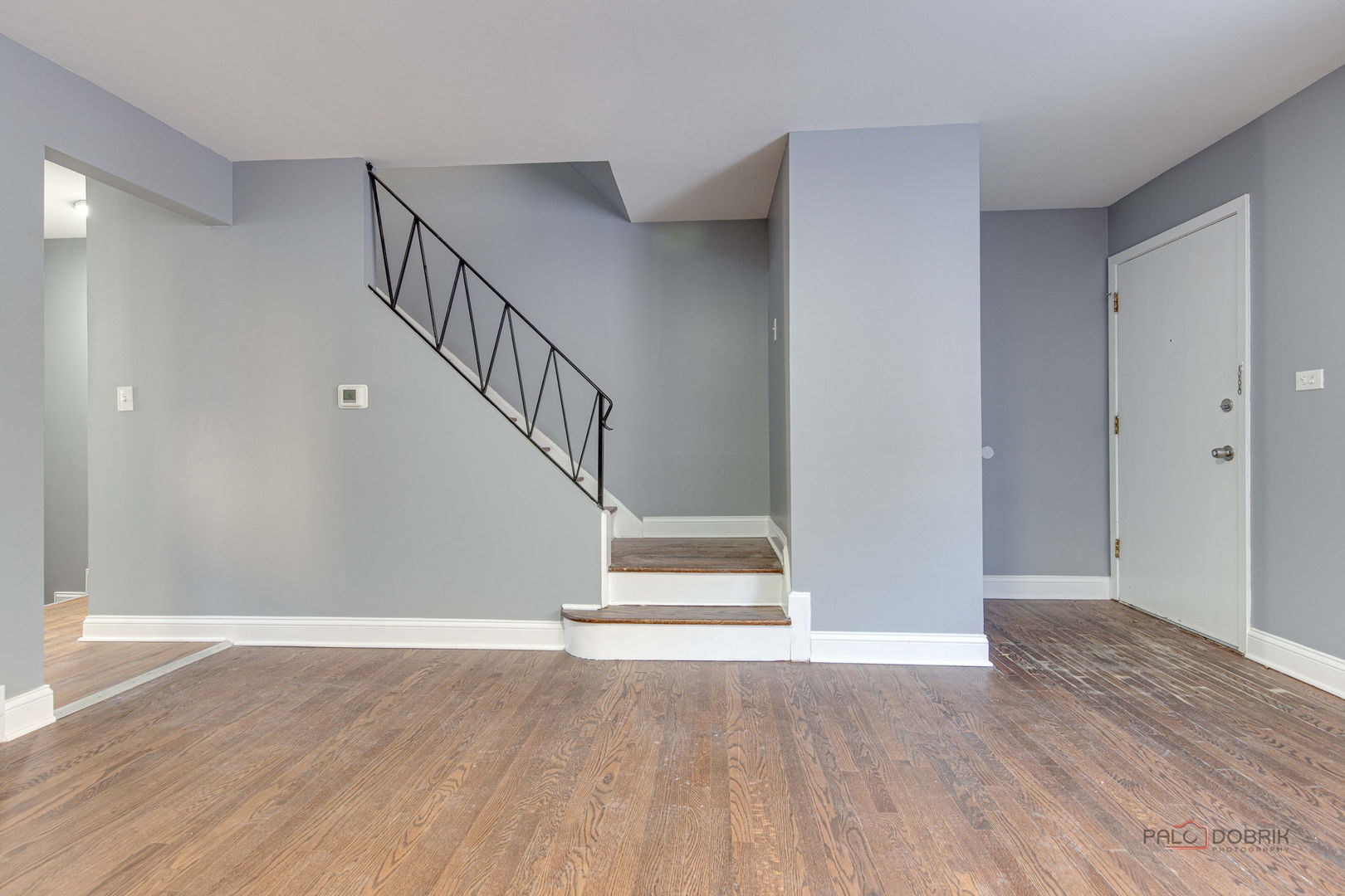 9463 Niles Center Road, Unit E Skokie, IL 60076 - Photo 6 of 30 a view of entryway with wooden floor