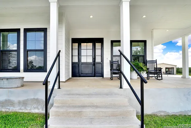 a view of staircase with a rug