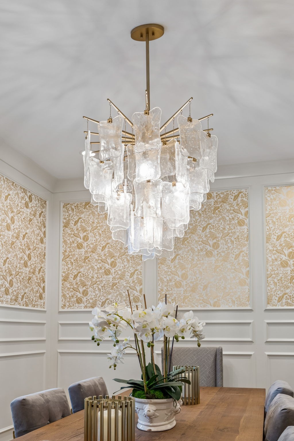 905 West 7th Street Columbia, TN 38401 - Photo 19 of 94 a view of a dining room with furniture a chandelier and large windows