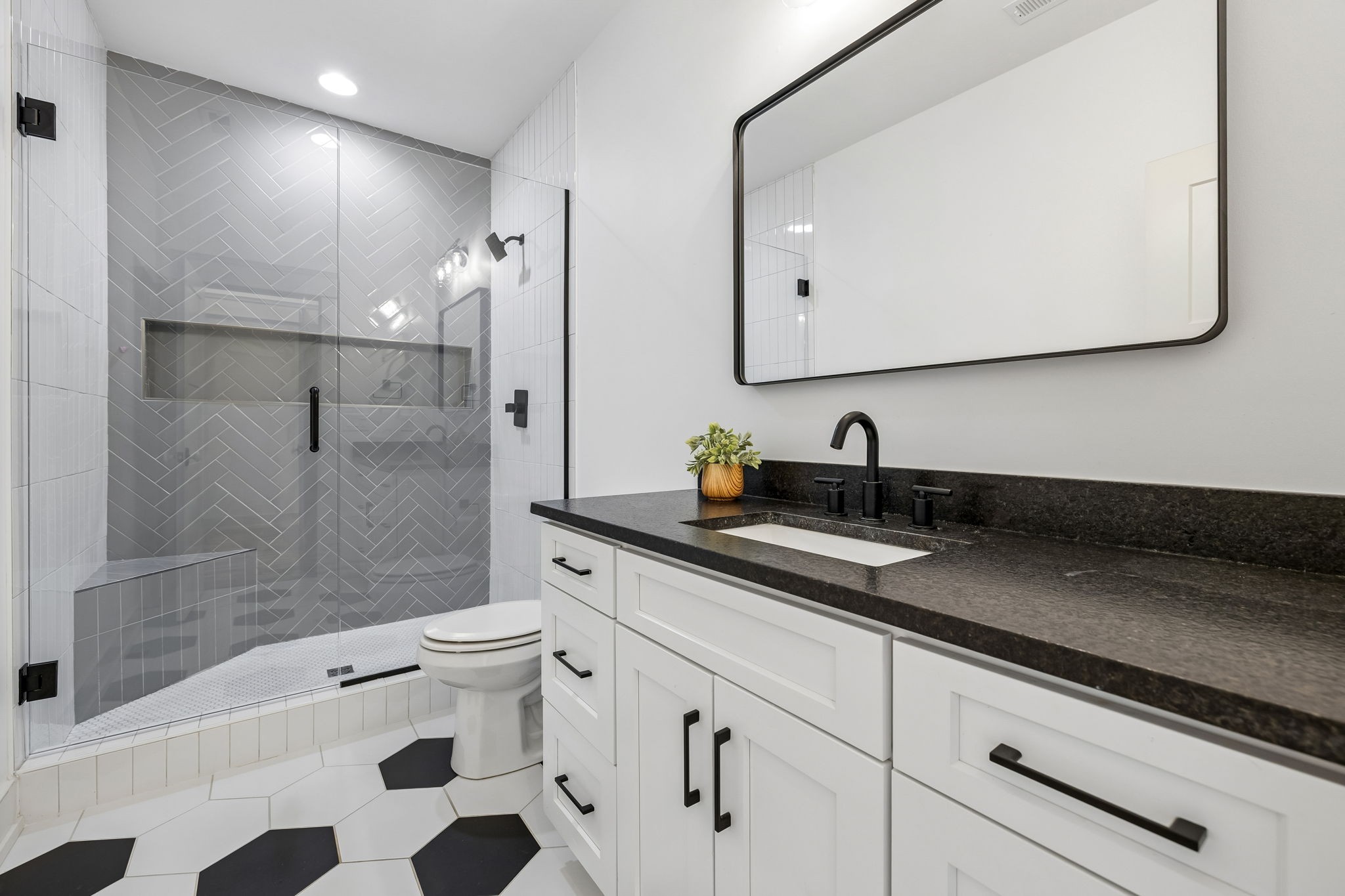 905 West 7th Street Columbia, TN 38401 - Photo 67 of 94 a bathroom with a double vanity sink mirror and shower