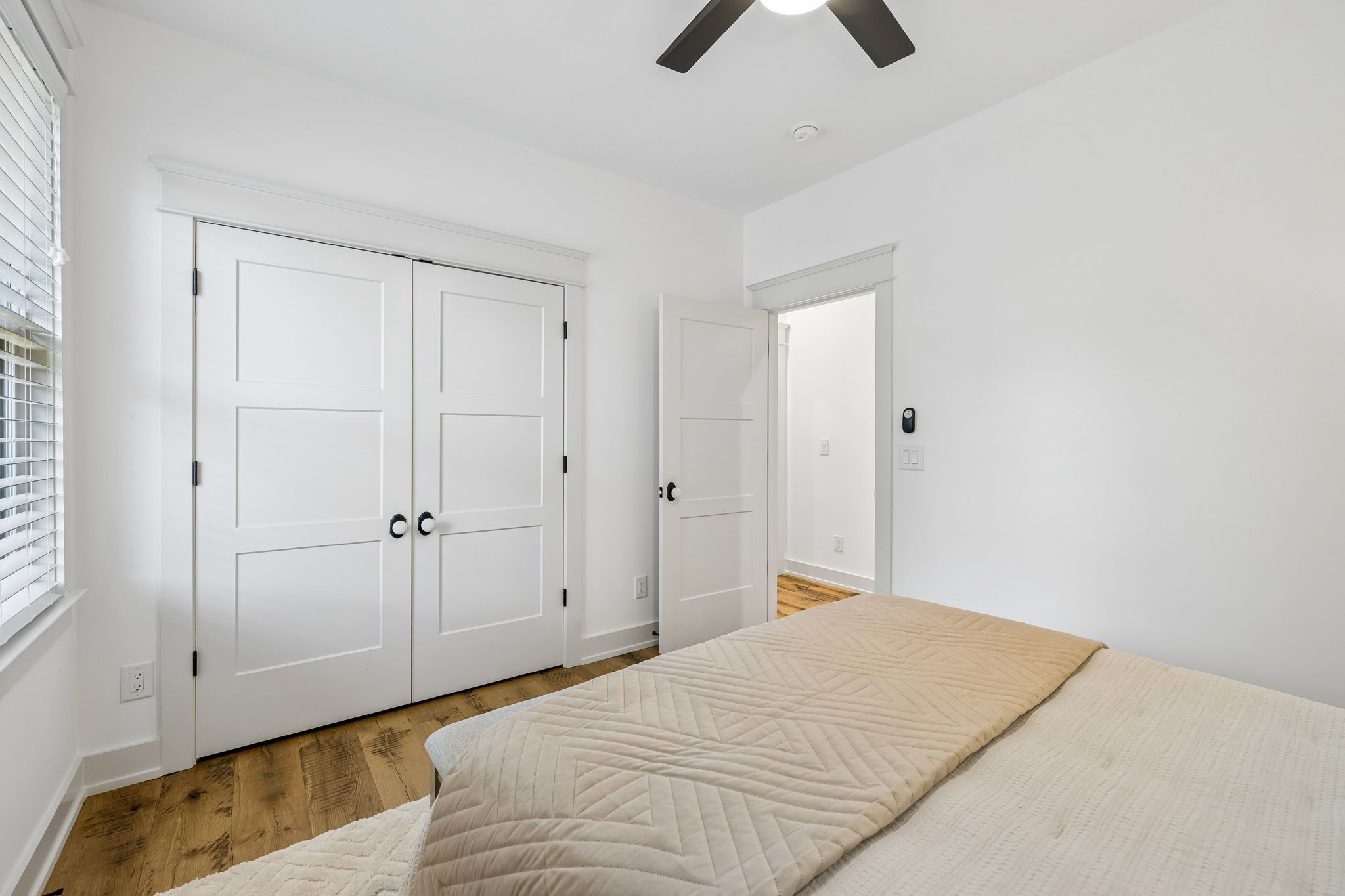 905 West 7th Street Columbia, TN 38401 - Photo 71 of 94 a bedroom with a bed and a chandelier fan