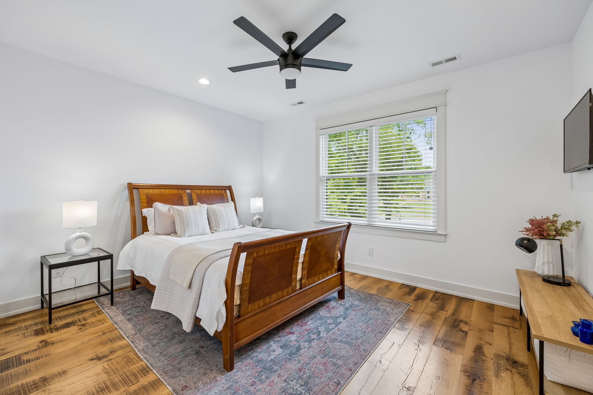 905 West 7th Street Columbia, TN 38401 - Photo 73 of 94 a bedroom with a bed and wooden floor