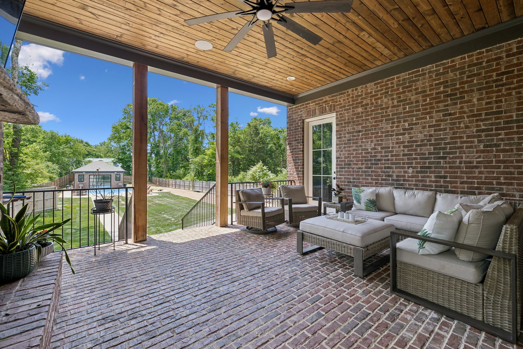 905 West 7th Street Columbia, TN 38401 - Photo 75 of 94 a living room with patio furniture and a floor to ceiling window