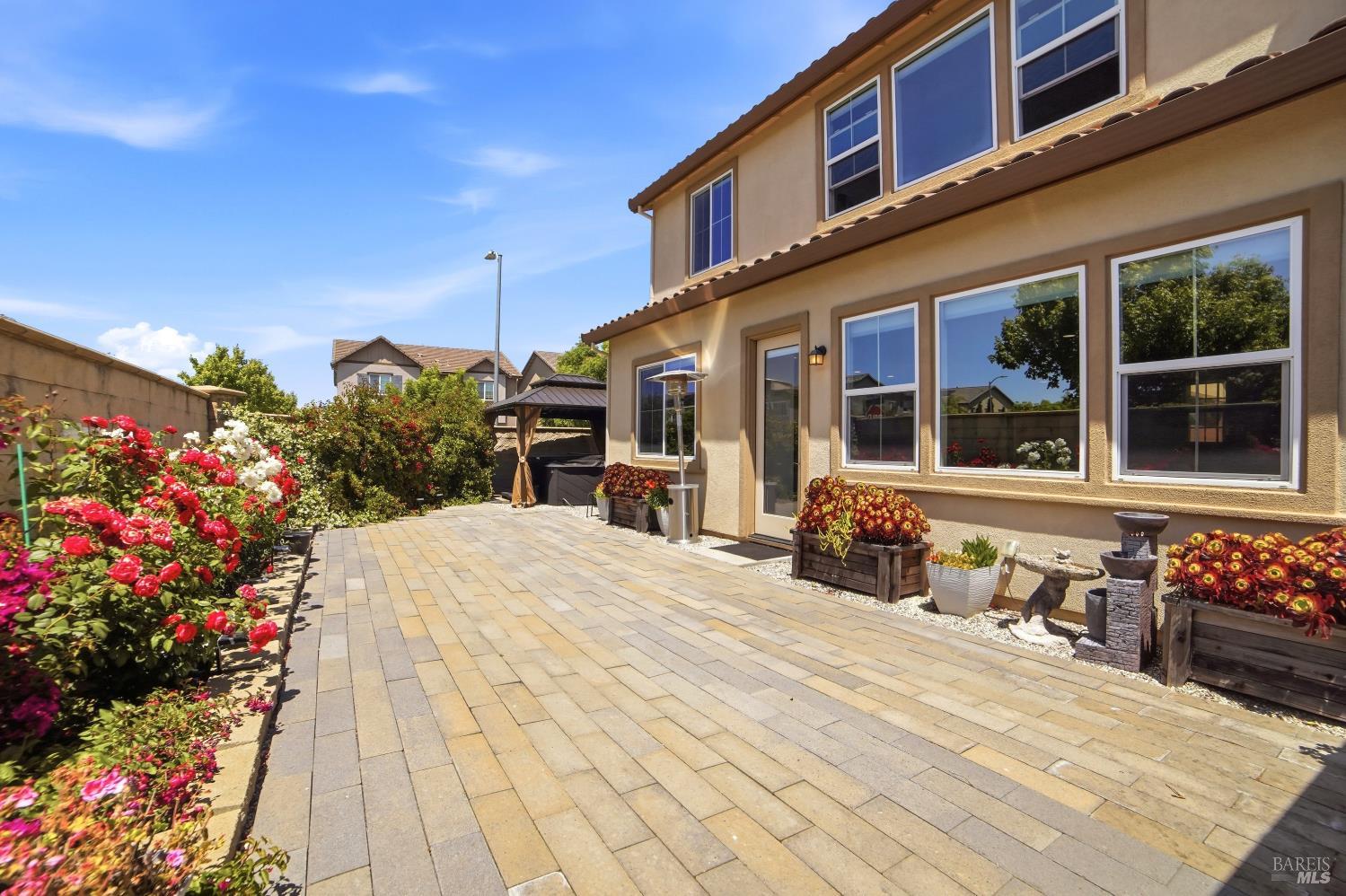5305 Kirby Place Rohnert Park, CA 94928 - Photo 31 of 37 a view of a house with a flower garden