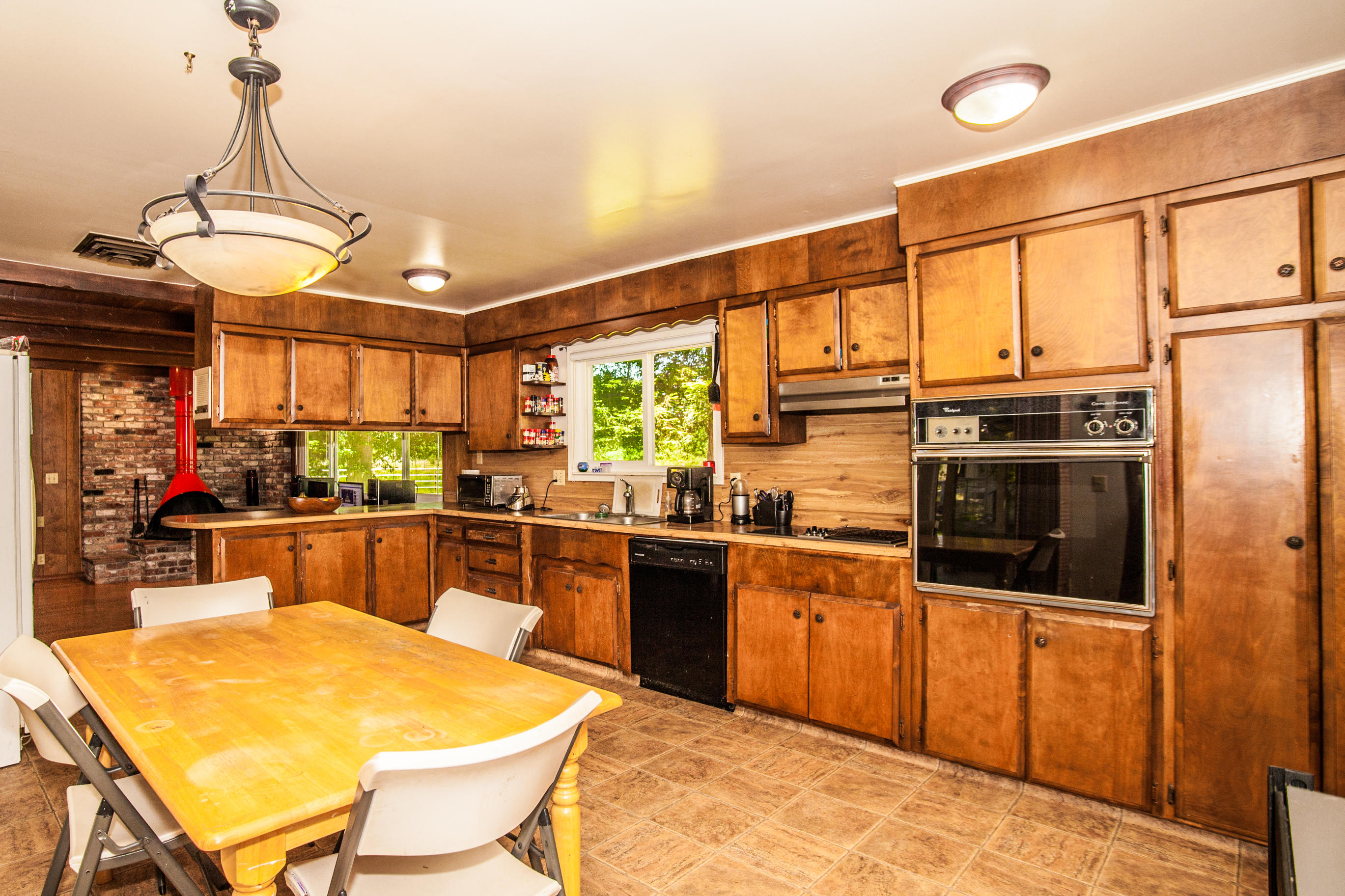 3684 Drybread Road Cottonwood, CA 96022 - Photo 23 of 30 a kitchen with stainless steel appliances granite countertop a stove and refrigerator