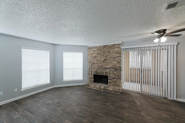 a view of kitchen with window and wooden floor