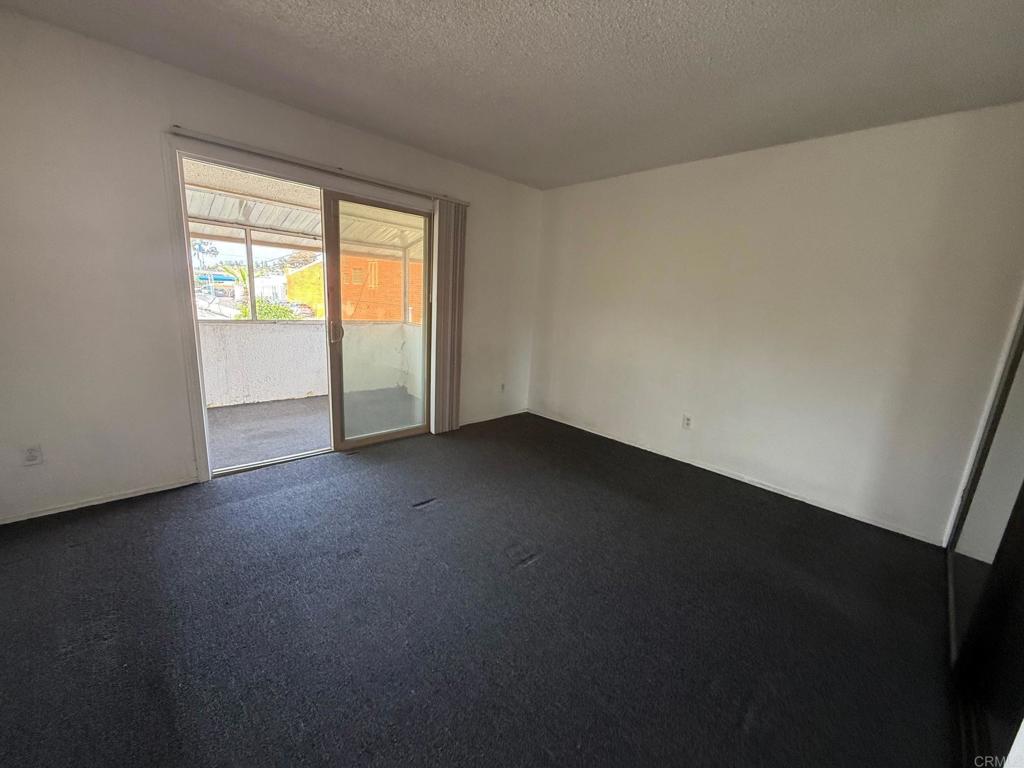 525 Shady Lane, Unit D El Cajon, CA 92021 - Photo 20 of 41 a view of an empty room with a window