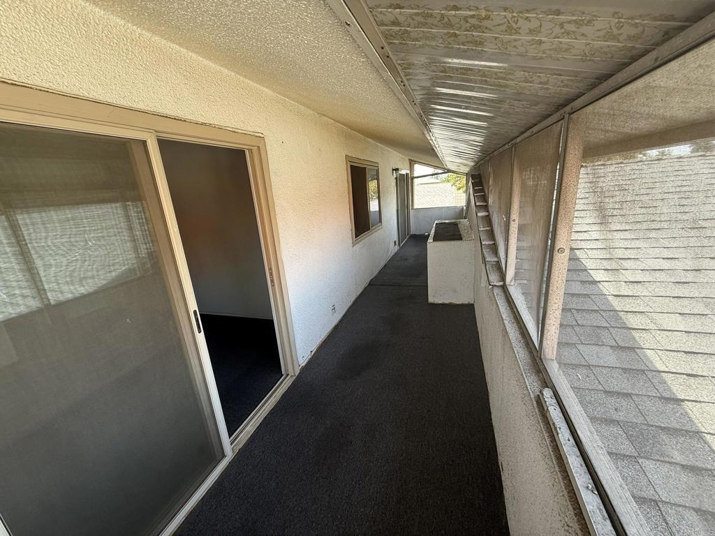 525 Shady Lane, Unit D El Cajon, CA 92021 - Photo 22 of 41 a view of a hallway