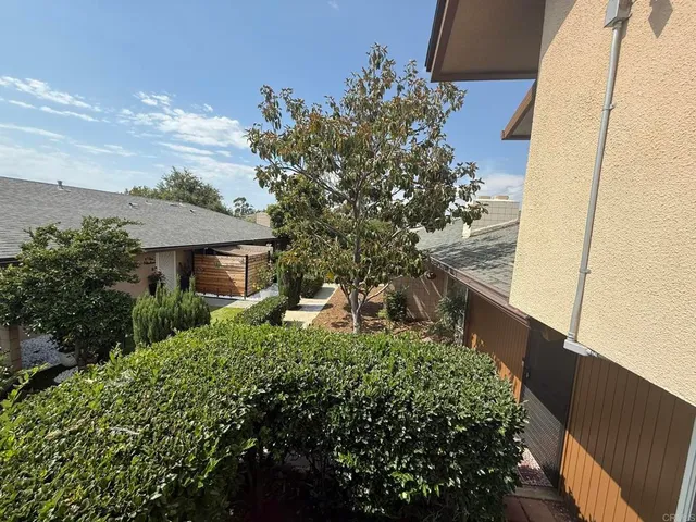 a house view with a outdoor space
