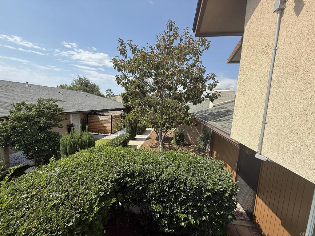 525 Shady Lane, Unit D El Cajon, CA 92021 - Photo 28 of 41 a front view of a house with a yard