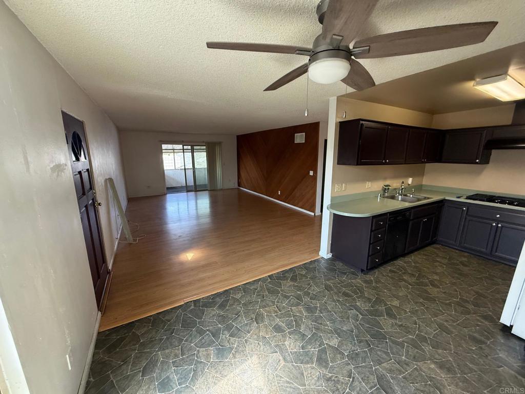 525 Shady Lane, Unit D El Cajon, CA 92021 - Photo 6 of 41 a view of a kitchen with a sink and cabinets