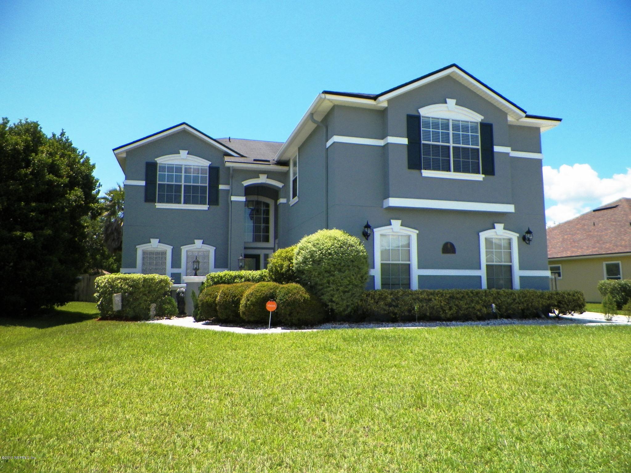 2133 Pond Spring Way Fleming Island, FL 32003 - Photo 1 of 22 Front of Home