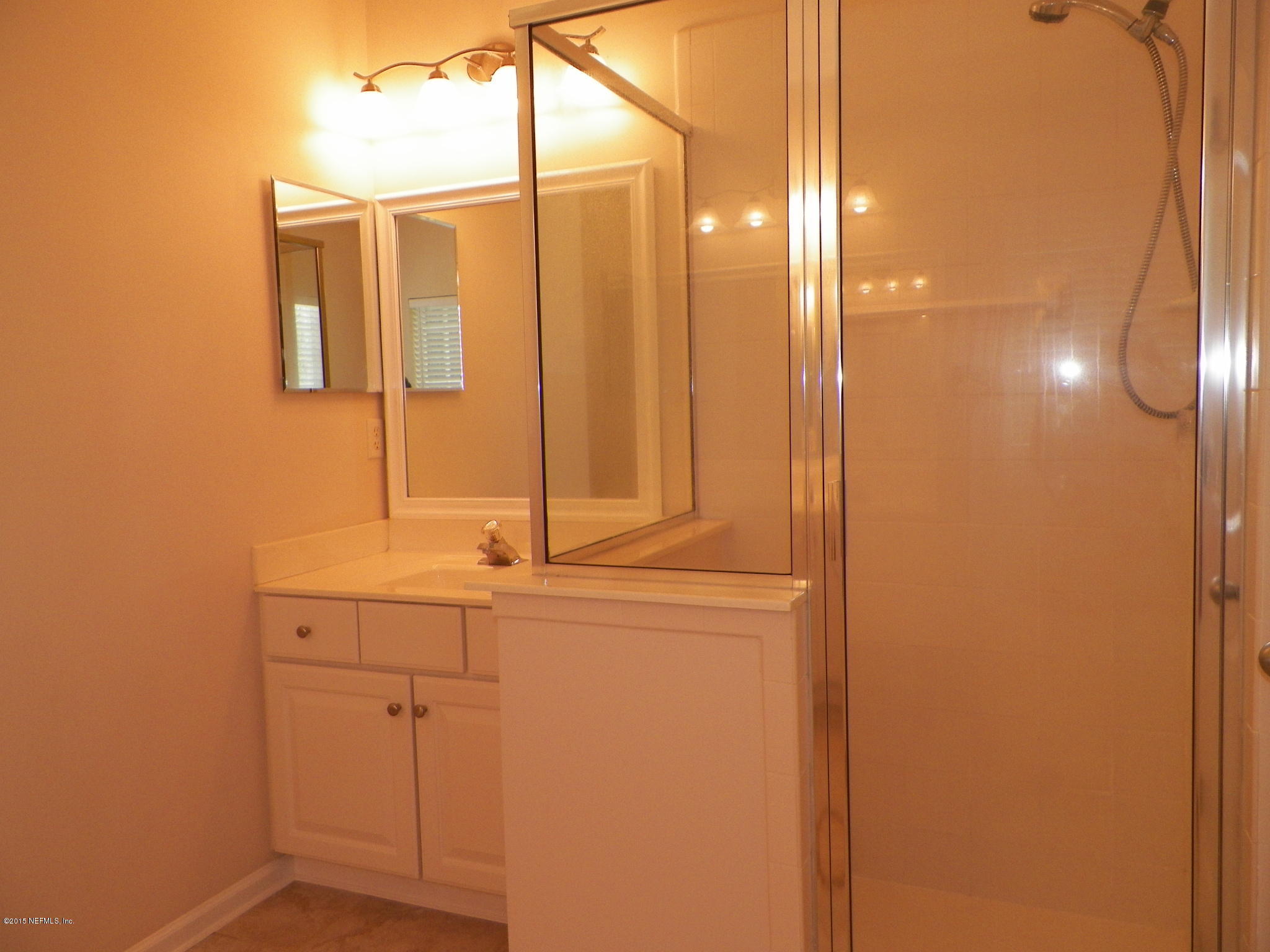2133 Pond Spring Way Fleming Island, FL 32003 - Photo 12 of 22 Owners suite shwr and vanity