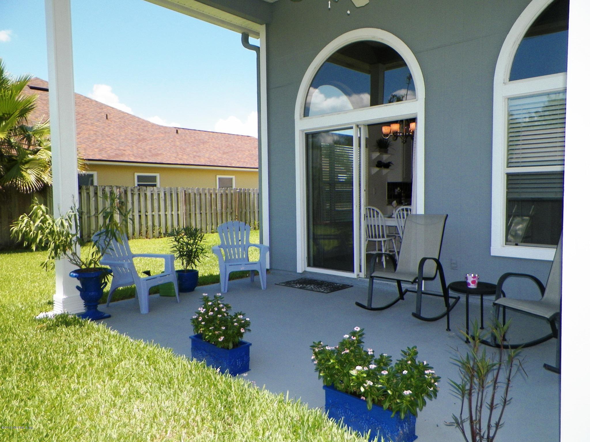 2133 Pond Spring Way Fleming Island, FL 32003 - Photo 21 of 22 Covered patio