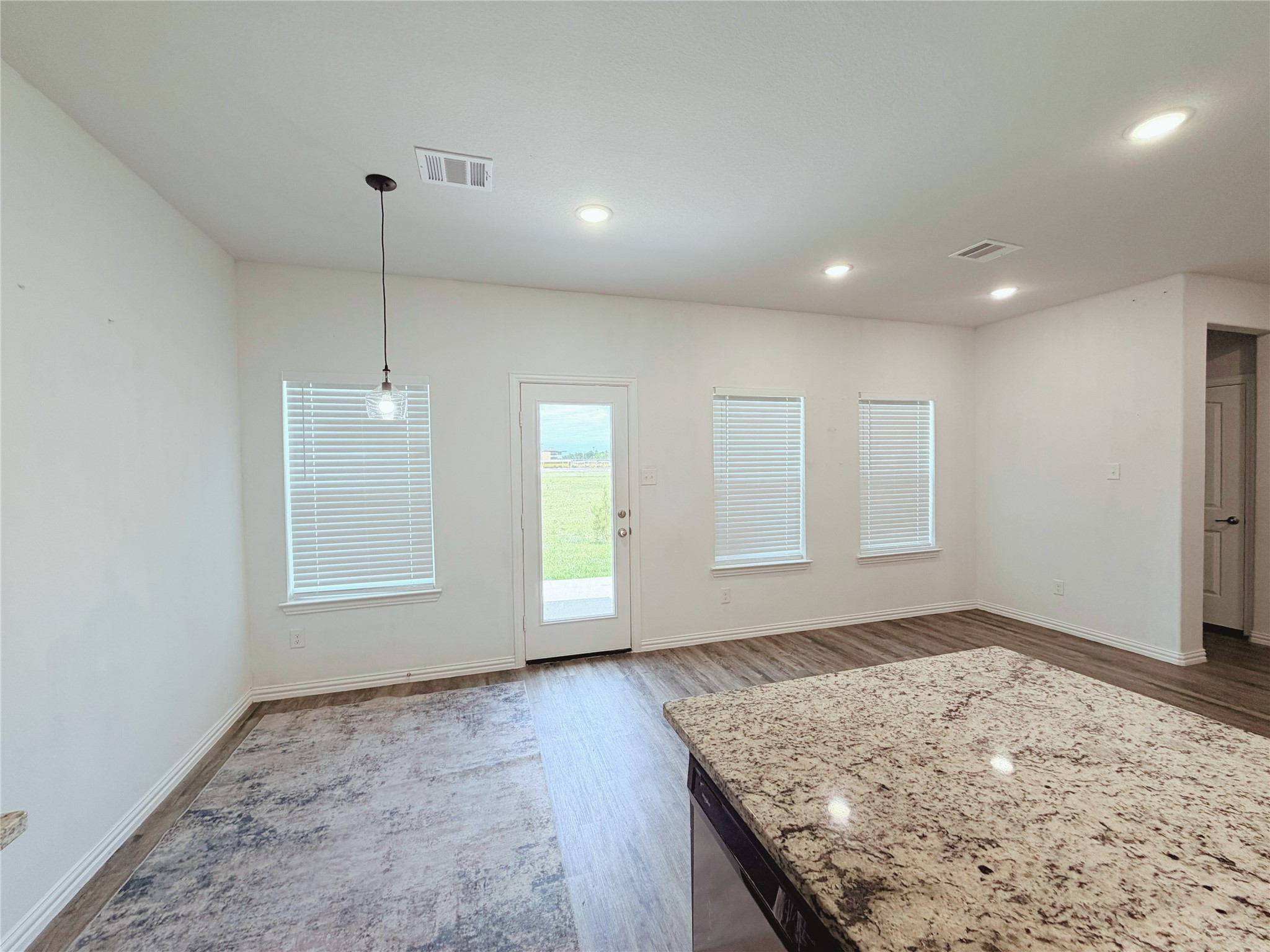 870 5102nd Road Cleveland, TX 77327 - Photo 11 of 27 an empty room with windows