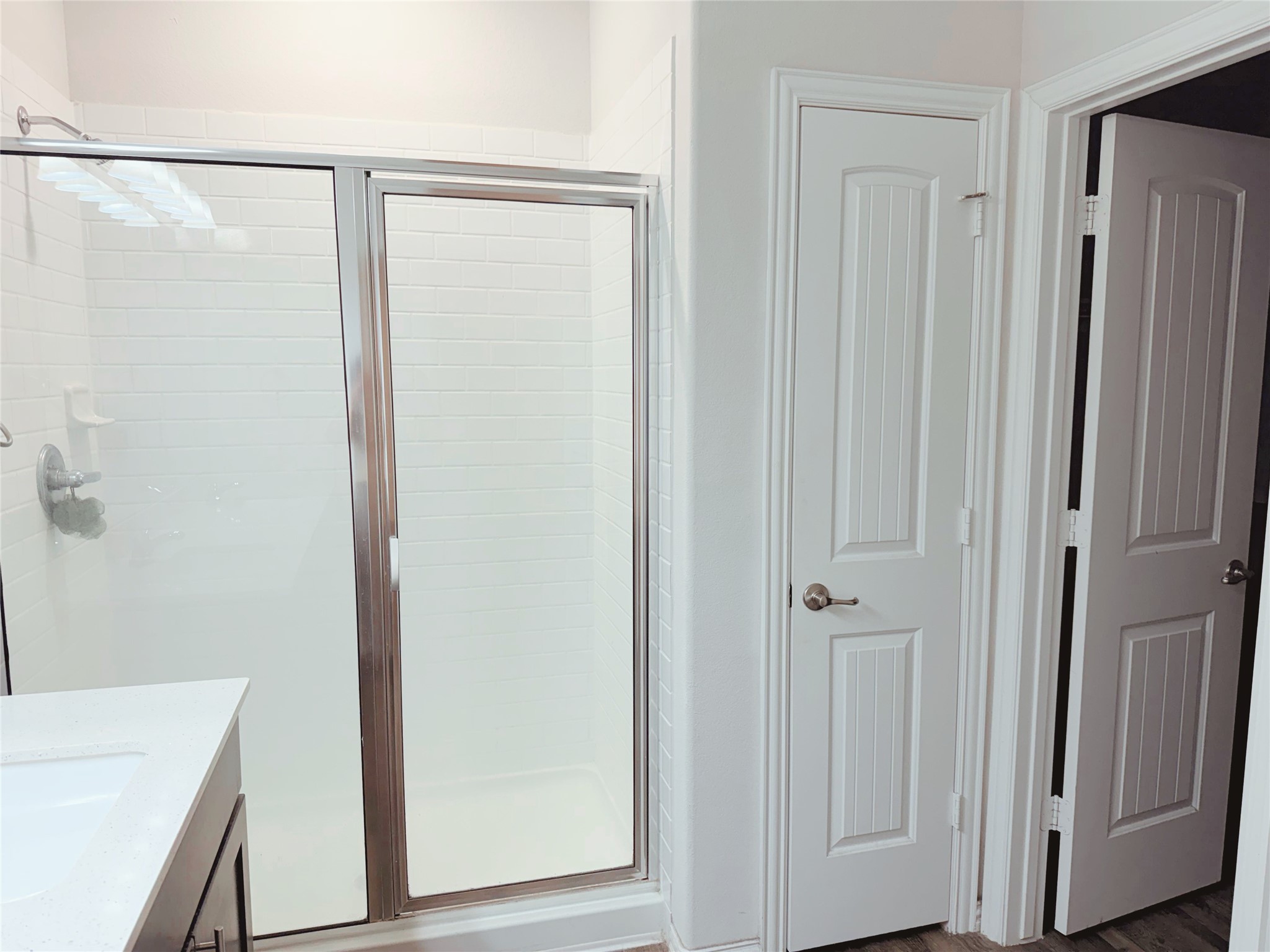 870 5102nd Road Cleveland, TX 77327 - Photo 19 of 27 a bathroom with a shower and a sink