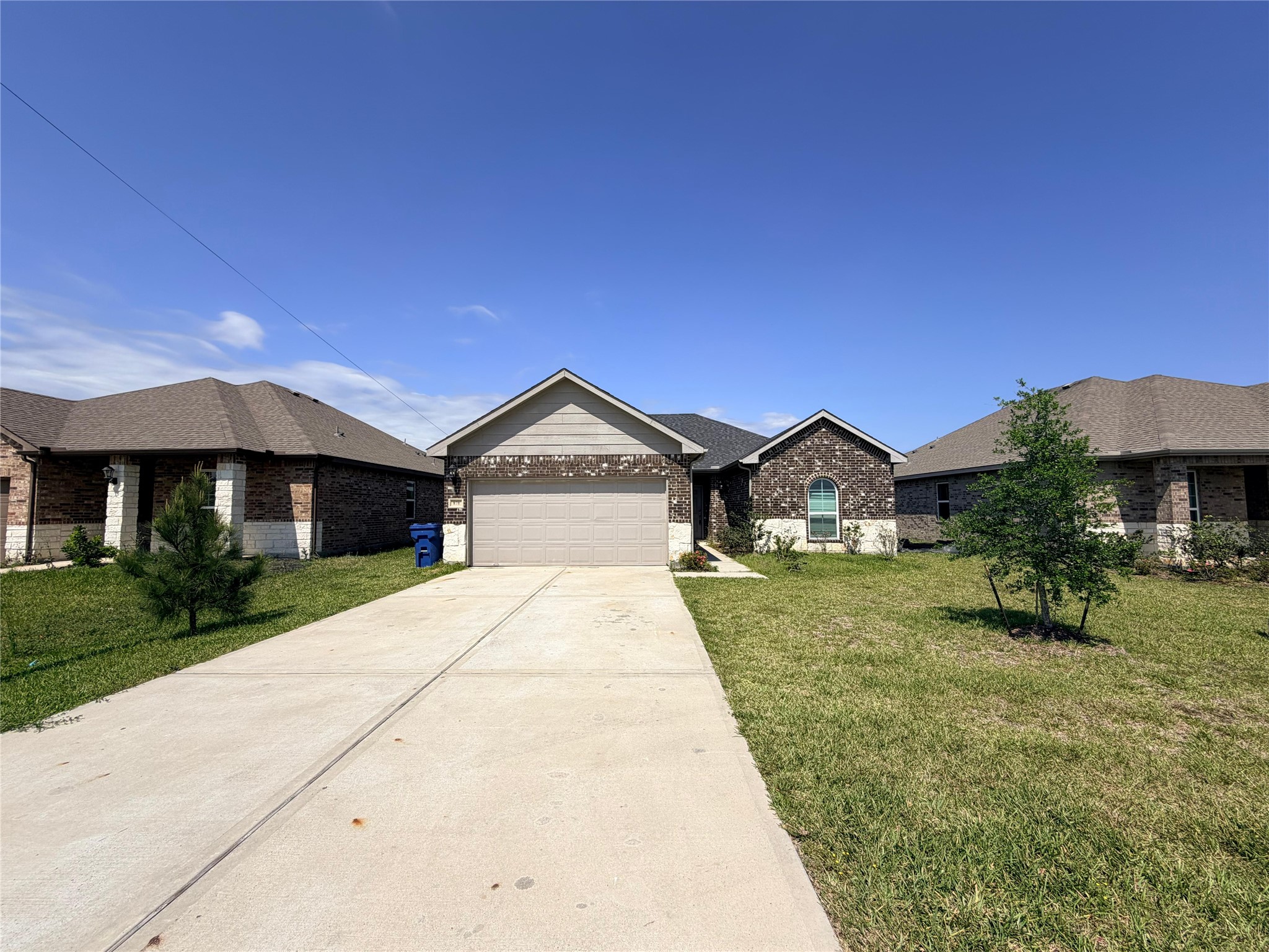 870 5102nd Road Cleveland, TX 77327 - Photo 2 of 27 a front view of a house with a yard