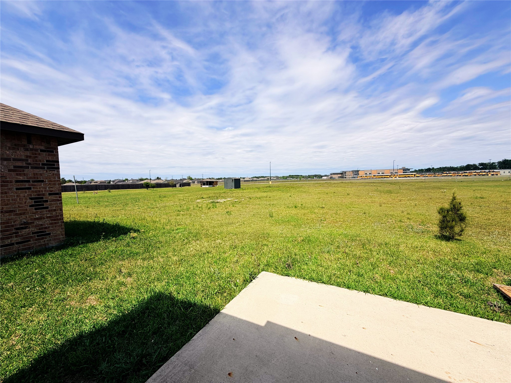 870 5102nd Road Cleveland, TX 77327 - Photo 25 of 27 a view of a lake with a big yard