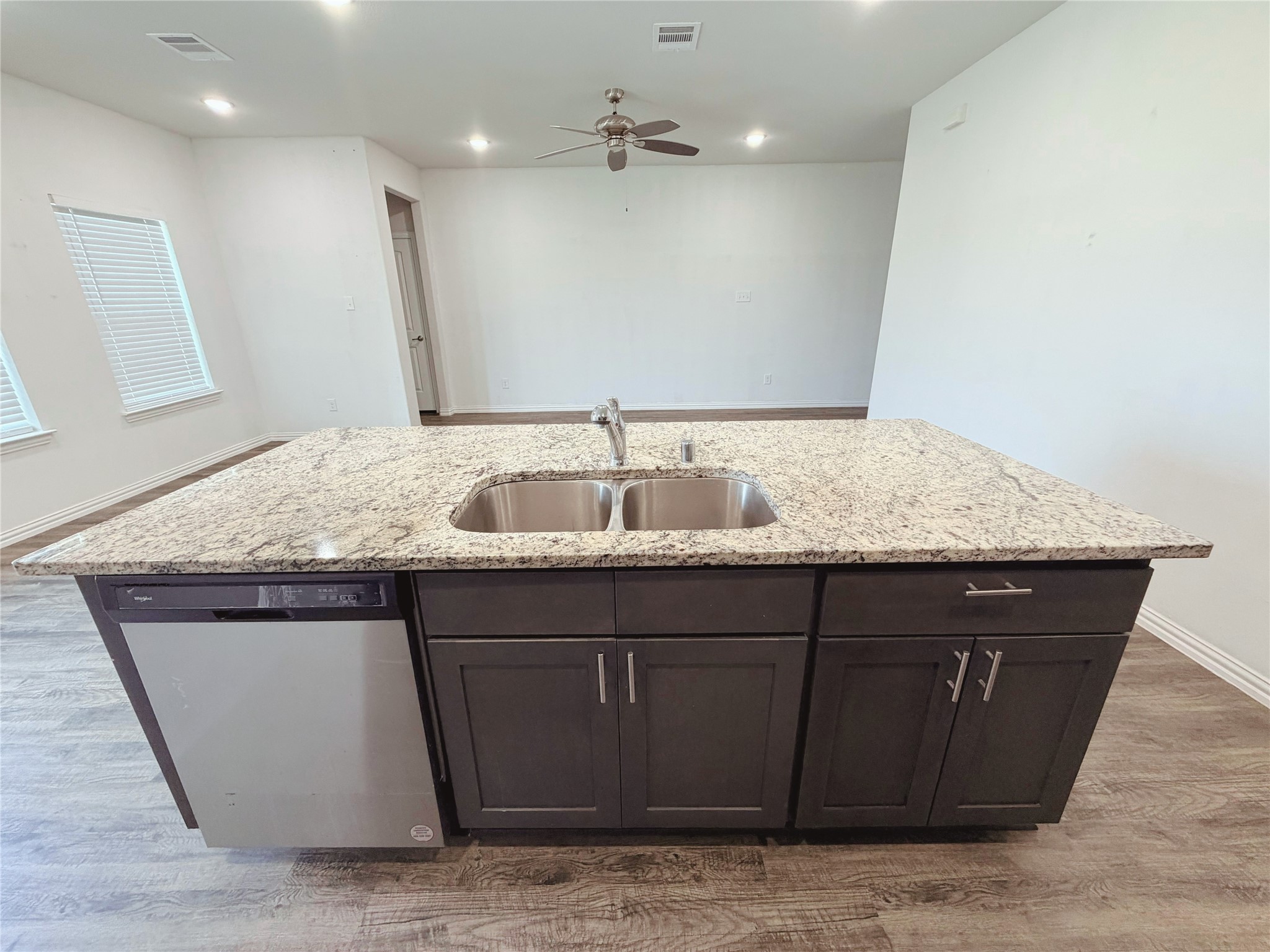 870 5102nd Road Cleveland, TX 77327 - Photo 9 of 27 a bathroom with a granite countertop sink and a mirror