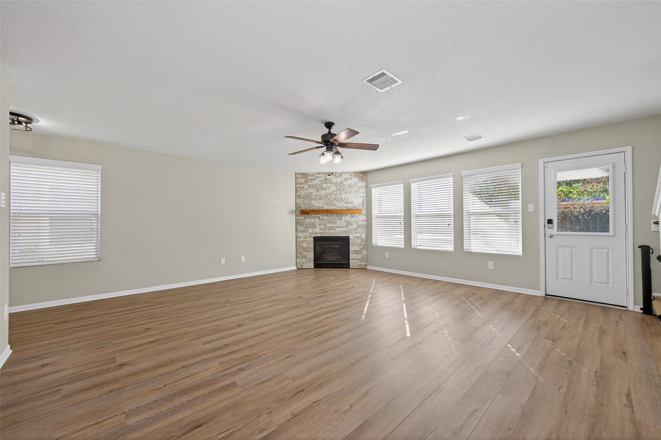 9940 Swallow Drive Conroe, TX 77385 - Photo 7 of 30 Living room with natural lighting.