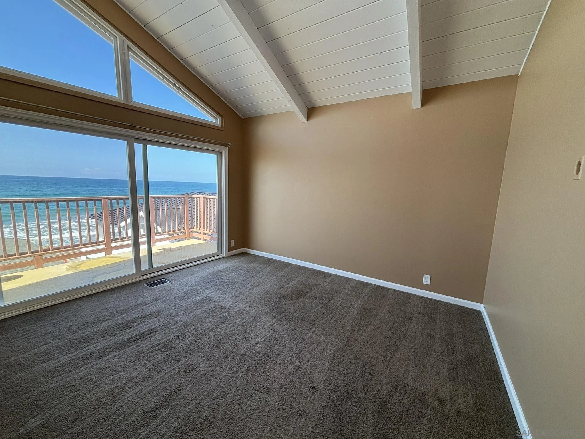 514 South The Strand, Unit D Oceanside, CA 92054 - Photo 14 of 18 a view of an empty room with a window