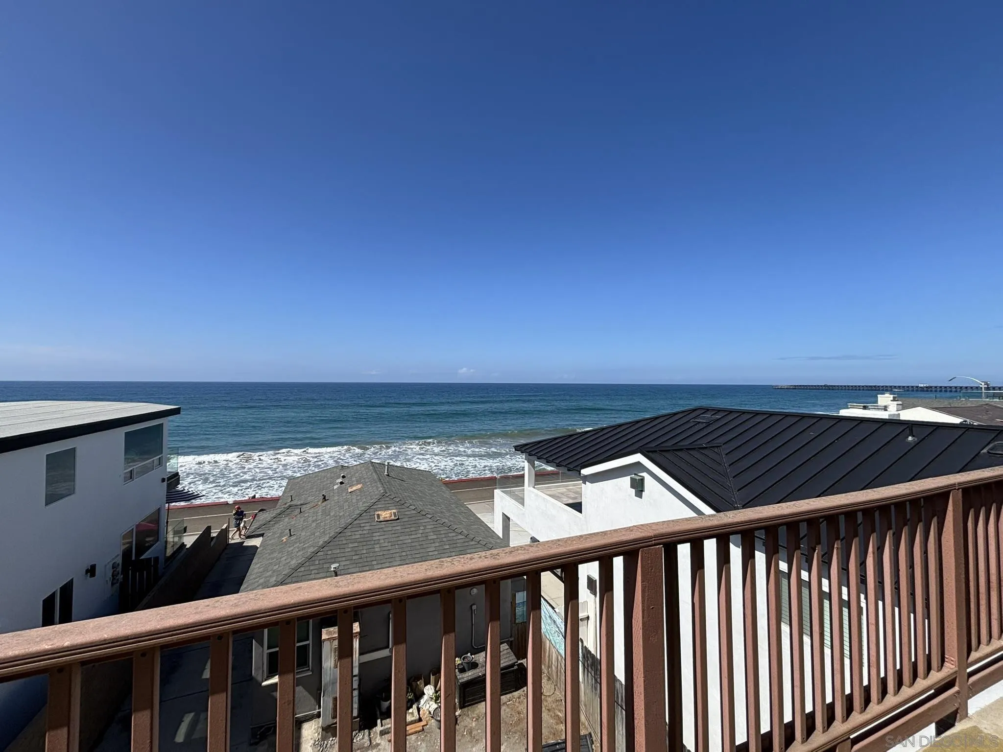 514 South The Strand, Unit D Oceanside, CA 92054 - Photo 3 of 18 a view of balcony with furniture