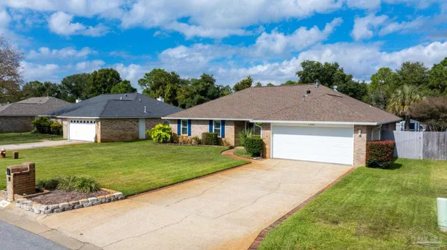 a view of house with garden