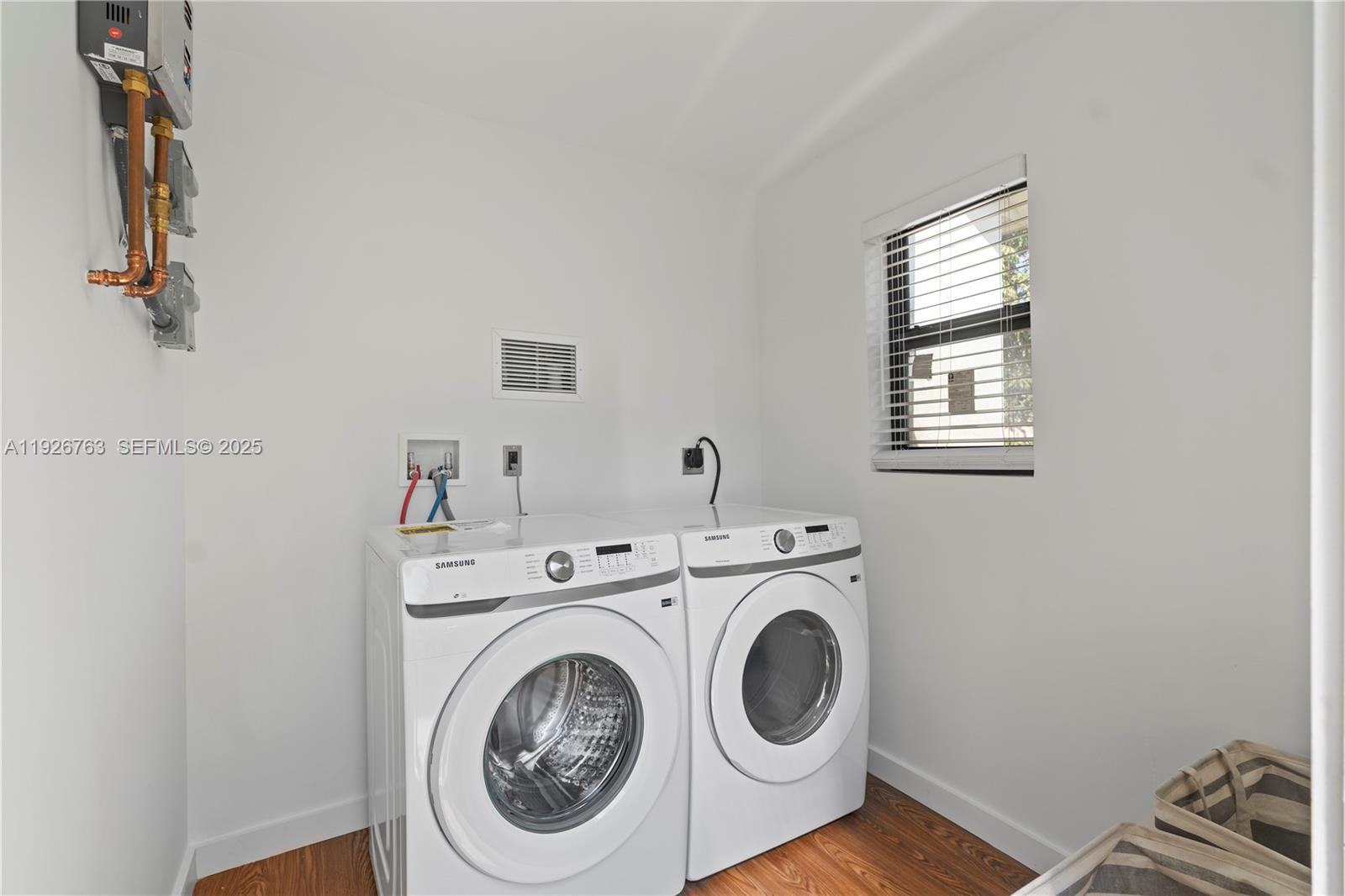 601 Southwest 1st Street Hallandale Beach, FL 33009 - Photo 16 of 33 a utility room with dryer and washer