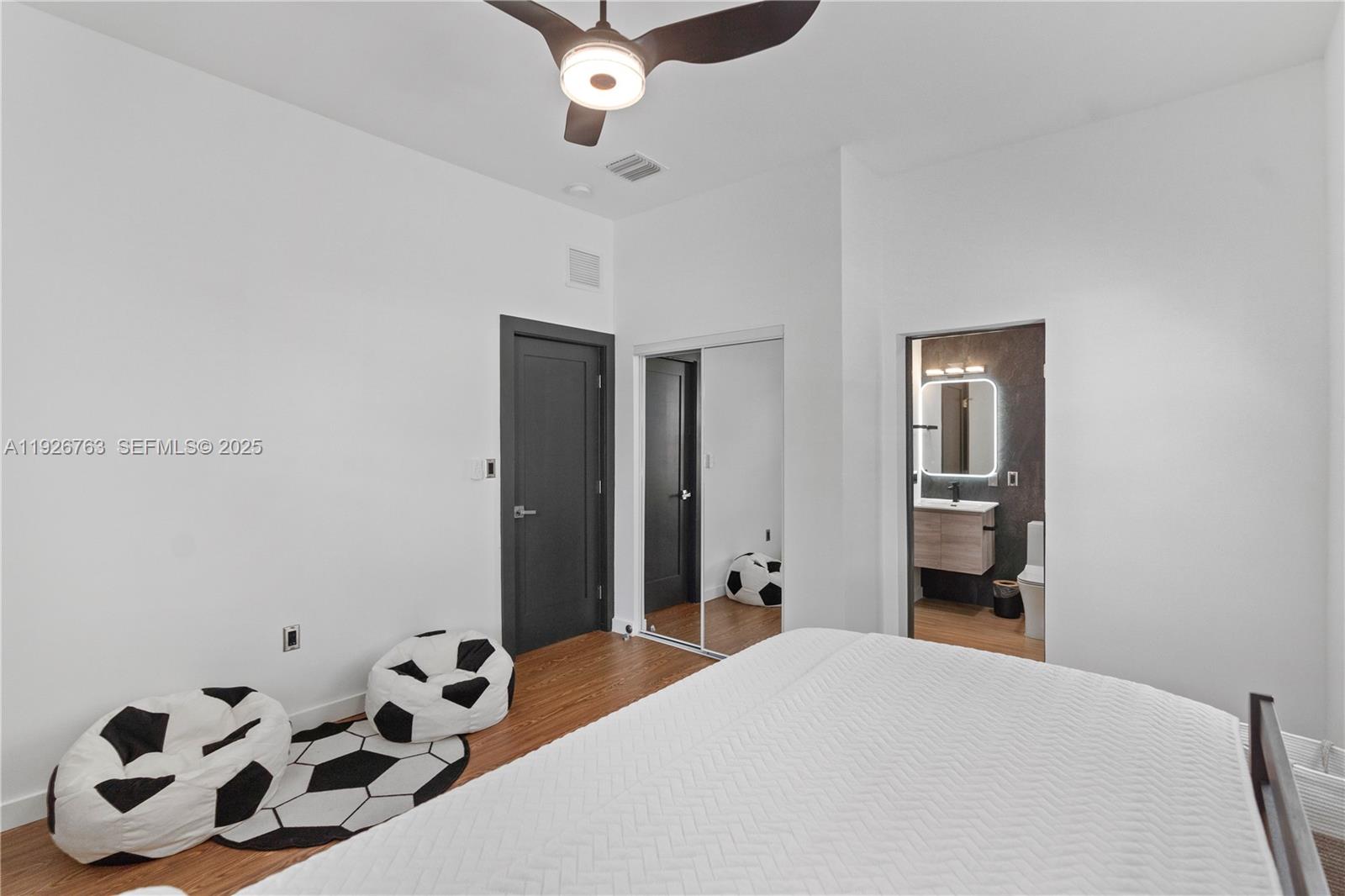 601 Southwest 1st Street Hallandale Beach, FL 33009 - Photo 20 of 33 a bedroom with a bed and a window