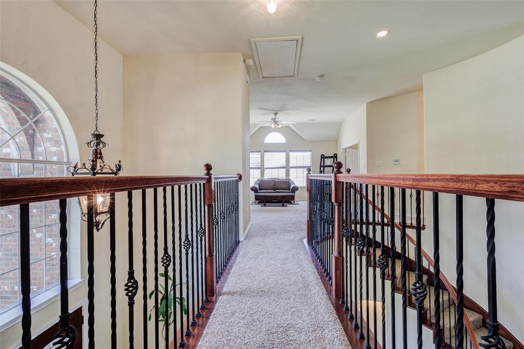 10414 Broadmoor Lane Rowlett, TX 75089 - Photo 27 of 38 Hall featuring attic access and carpet