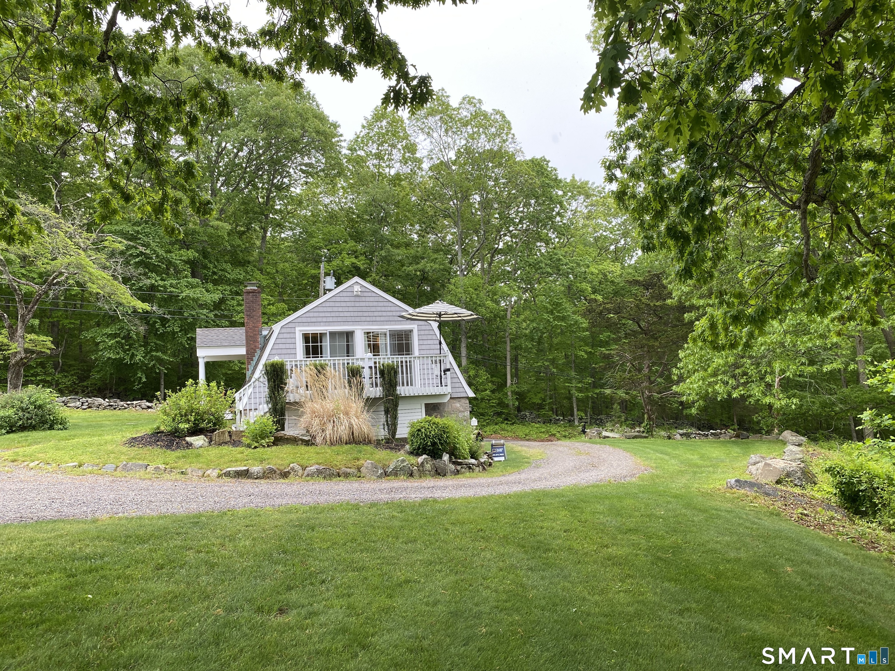 41 Old W Road East Haddam, CT 06423 - Photo 35 of 39 a front view of a house with a yard