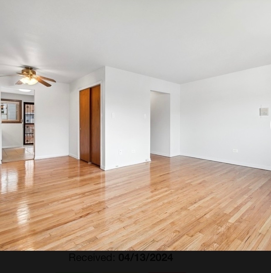 7019 North Ridge Boulevard, Unit 3B Chicago, IL 60645 - Photo 6 of 6 a view of empty room with wooden floor