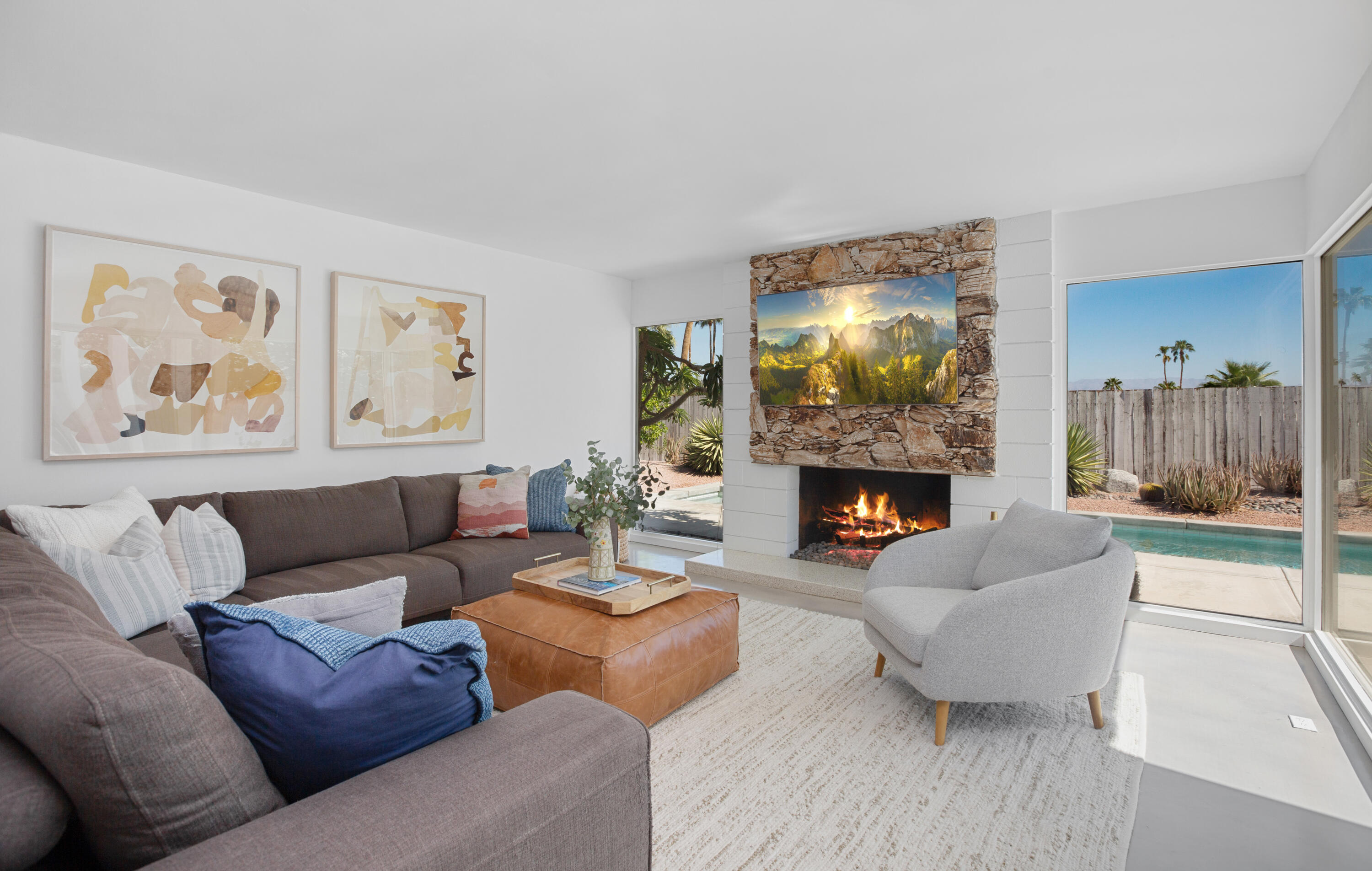 71382 Biskra Road Rancho Mirage, CA 92270 - Photo 8 of 41 a living room with furniture and a fireplace