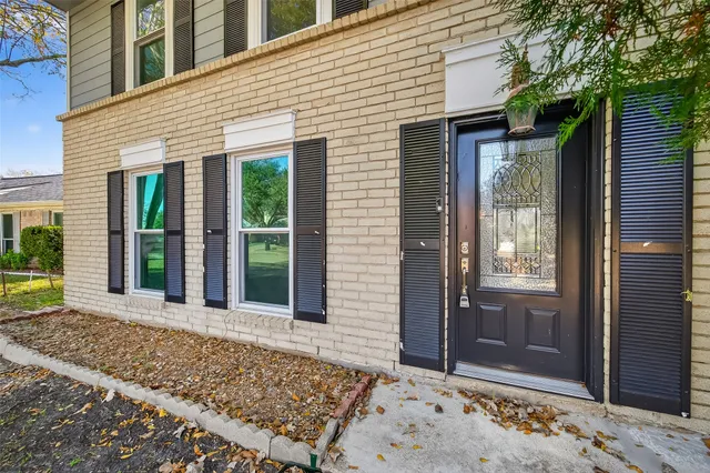 a view of a entryway door front of house