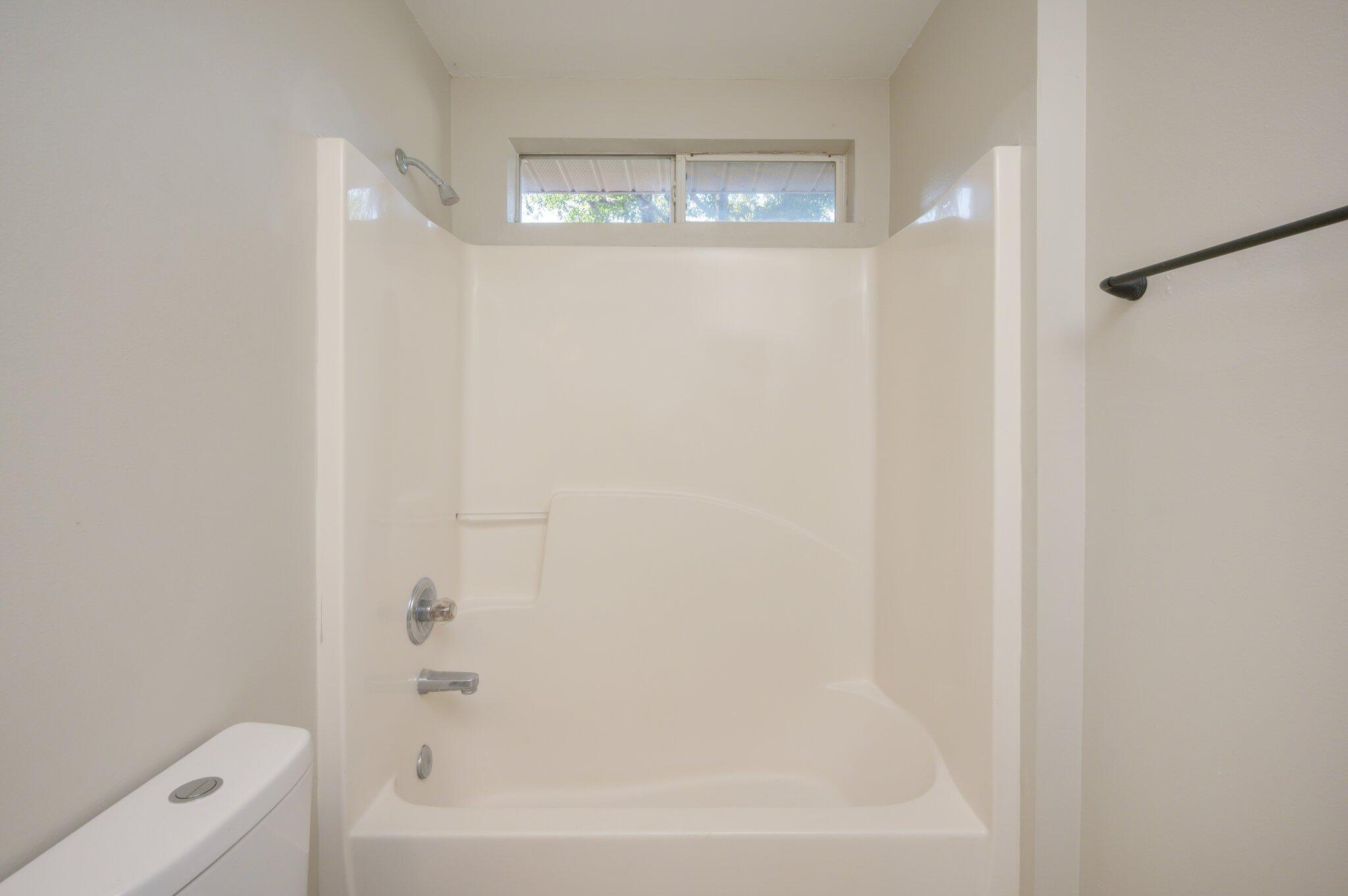 502 Hyde Park Drive Crestview, FL 32539 - Photo 22 of 35 a bathroom with a bathtub and shower