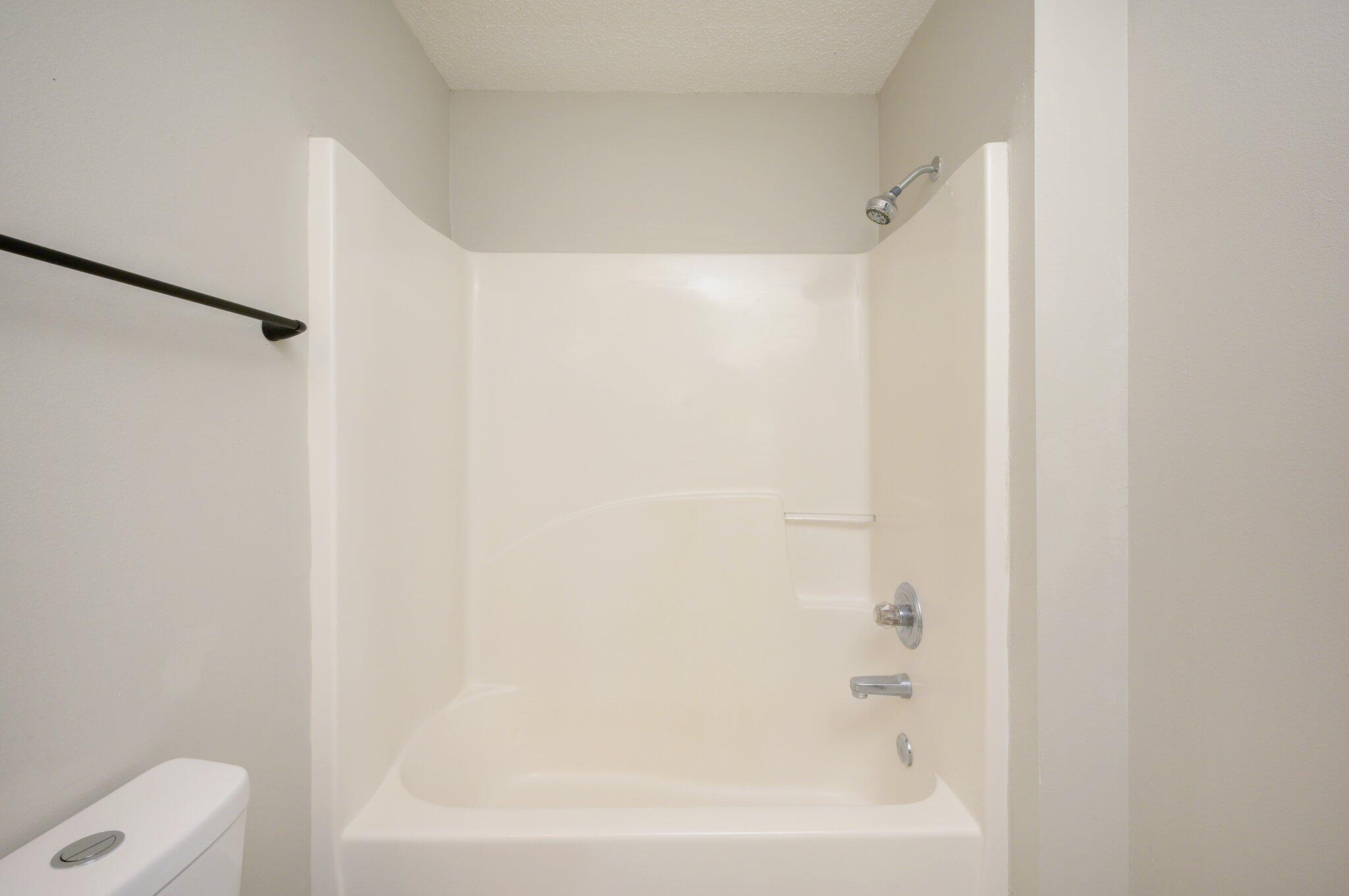 502 Hyde Park Drive Crestview, FL 32539 - Photo 28 of 35 a bathroom with a bathtub and a shower