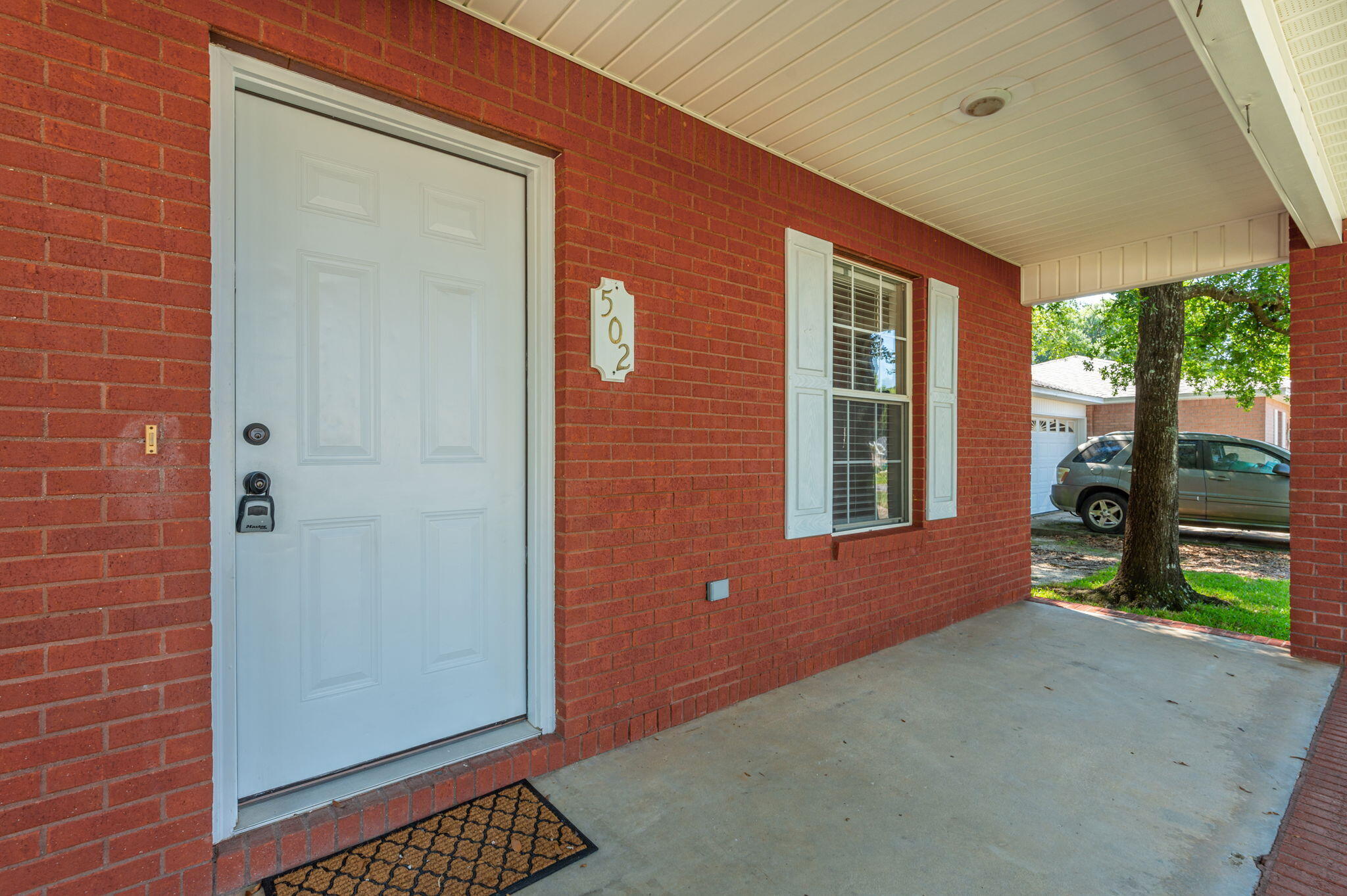 502 Hyde Park Drive Crestview, FL 32539 - Photo 4 of 35 a view of an outdoor space and a porch