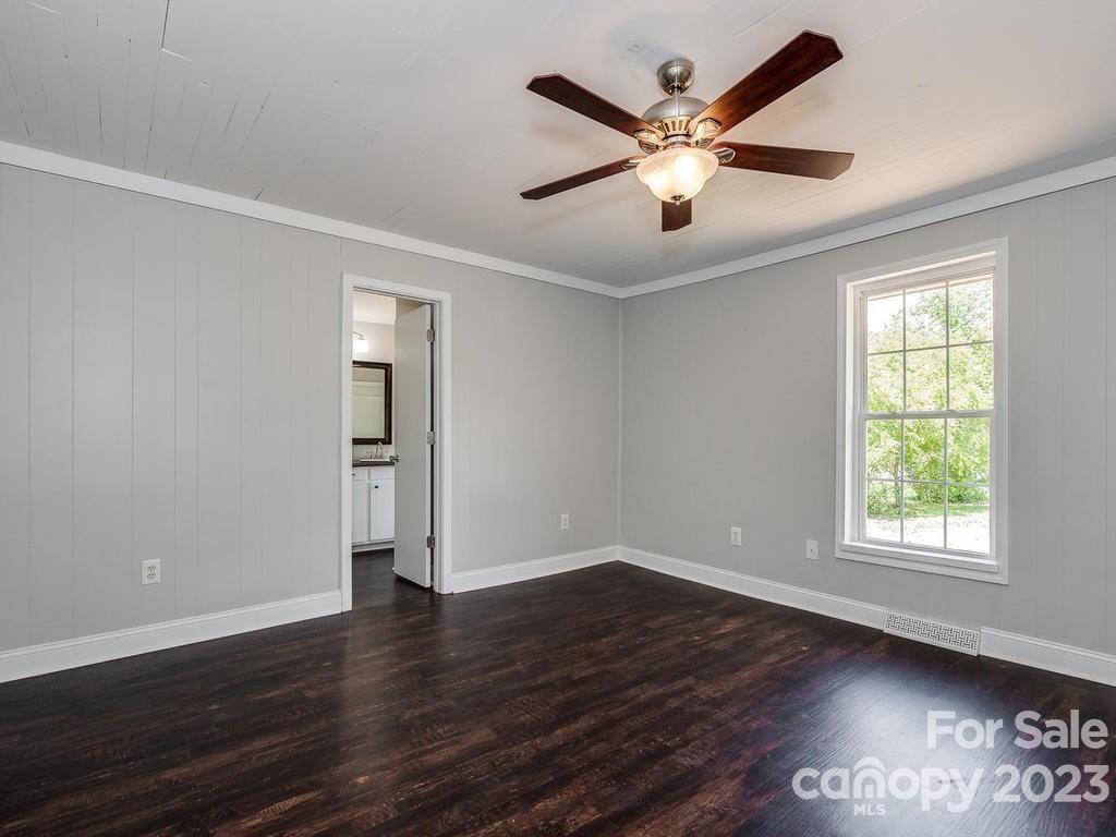 2589 Fay Jones Road Denver, NC 28037 - Photo 11 of 15 wooden floor in an empty room with a window